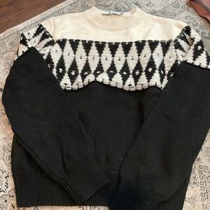 Cream and black sweater